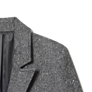Women's French style grey herringbone tweed blazer jacket with sharp shoulder detail