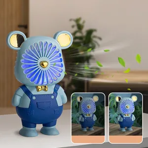 Portable blue cartoon bear USB fan with integrated LED night light for desktop use
