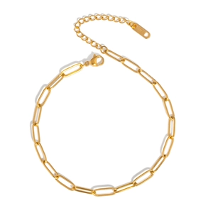 Detail shot of the lobster clasp and stainless steel hallmark on the gold paperclip chain