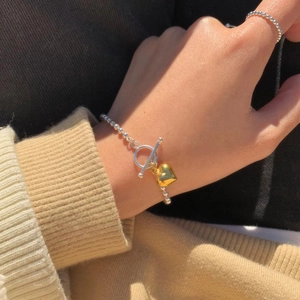 Elegant S925 sterling silver beaded bracelet with gold heart charm and OT clasp