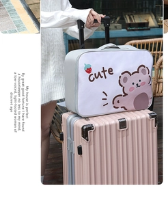 Cartoon travel bag fixed on pink suitcase handle showing the portable back sleeve design