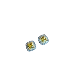 Square halo stud earrings with cushion-cut yellow gemstone and golden setting
