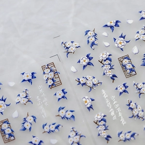 3D embossed nail art stickers featuring blue camellias and traditional window patterns