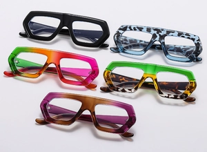 Detailed view of bold geometric eyewear frames in five gradient and patterned finishes