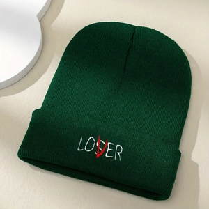 Dark green knitted beanie with creative LOVER embroidery on the folded cuff