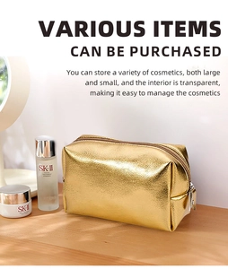 Detailed macro view of gold cosmetic bag with smooth metal texture and secure zipper seal