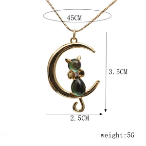 Detail view of fox moon necklace with size measurements 3.5cm height and 45cm chain