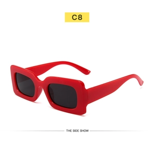 Detailed side view of vintage square red sunglasses with grey lenses and C8 color code