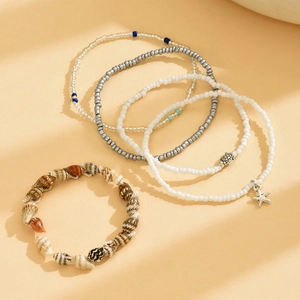 Ensemble de 5 bracelets de cheville avec coquillages naturels et perles de style plage