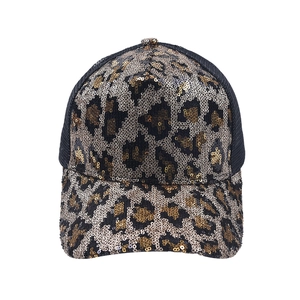 Close-up of leopard print sequins and breathable black mesh on the baseball cap