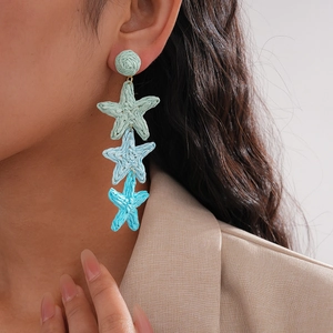 Handcrafted triple blue starfish raffia drop earrings for women seaside vacation style