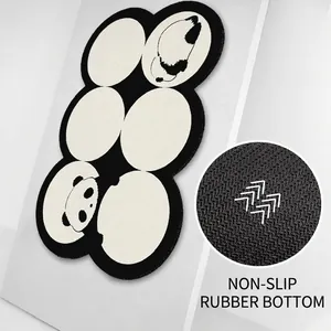 Absorbent panda shaped bath mat with a non-slip rubber backing for bathroom safety