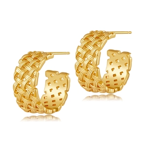 Elegant gold C-shaped hoop earrings with woven texture on a clean white background