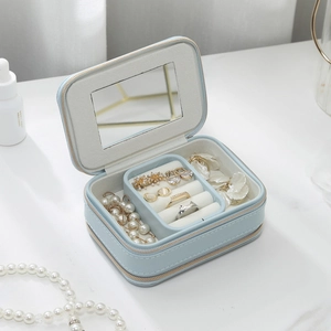 Portable double-layer travel jewelry box in sky blue PU leather with built-in mirror