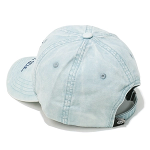 Detail view of light blue denim baseball cap showing embroidery and adjustable strap