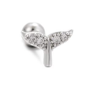 Macro detail of silver fishtail cartilage stud earring with sparkling cubic zirconia