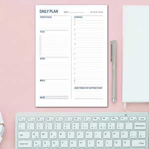 Daily schedule planner page with 24-hour timeline and habit tracking layout