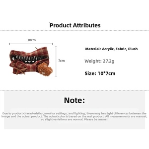 Detail view of 10x7cm red plaid hair claw with plush bear and size specifications
