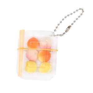 Miniature dollhouse food box toy with colorful fruit spheres and mini chopsticks