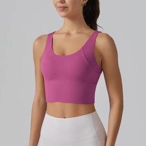 Close-up of the magenta V-back sports bra featuring high-elasticity knit fabric for yoga