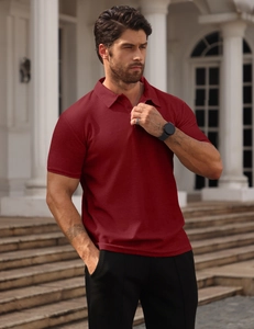 Detail of dark red waffle knit polo shirt showing texture and button-down collar