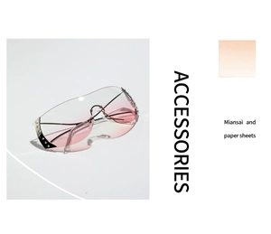 Detail of pink gradient lenses with silver metal rivets on Y2K rimless sunglasses