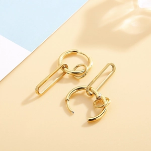 Polished 18k gold plated multi-layer geometric hoop earrings for women on a dual-tone background
