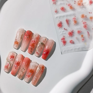 Elegant long coffin press-on nails with 3D pink rose designs and gold foil accents