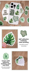 Detail of waterproof monstera leaf stickers and motivational quotes on mobile phone