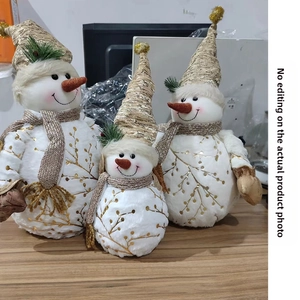 Three plush Christmas snowmen with gold sequined hats and matching scarves in various sizes