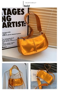 Detailed view of the metallic gold shoulder bag featuring silver rivets on the strap