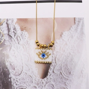 Bohemian evil eye beaded charm necklace with golden snake chain and metal spherical beads