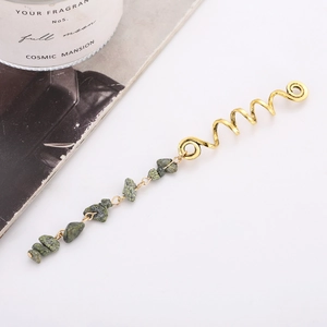 Golden spiral hair jewelry with green natural stone pendant on white background