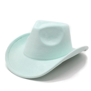 Close-up of mint green suede cowboy hat with rolled brim and indented crown detail