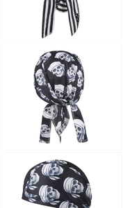 Detail of paisley pirate headscarf showing American flag and skull prints on mesh fabric