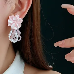Pink flower pearl earrings with elegant multi-strand drop fringe and luxury crystal accents