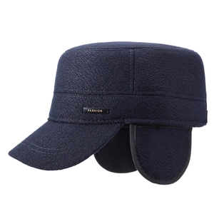 Men's navy blue thermal flat top hat with ear flaps and metal fashion plate detail