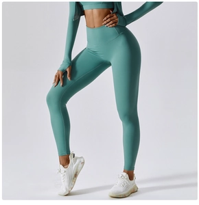 Detailed texture of high-elastic quick-dry mint green yoga pants and sports top set