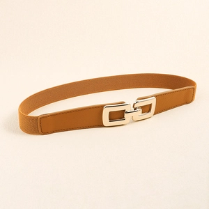 Close-up of women's elastic waist belt with camel leather and gold interlocking buckle