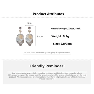Detailed view of zircon shell tassel earrings showing exact dimensions and metallic textures