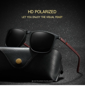 Detail of matte black polarized sunglasses with distinct red striped temple decor