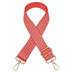 Adjustable bag strap with red and white wave pattern and gold metal buckles, Style 26