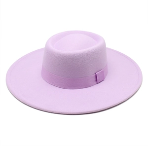 Minimalist lavender wool felt boater hat with a wide brim and matching ribbon bow for winter
