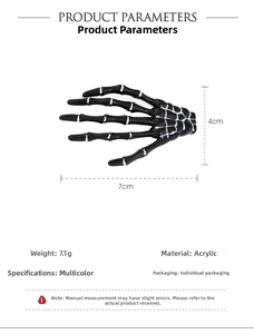 Detailed macro view showing the 7x4cm black acrylic skeleton hand hair clip dimensions