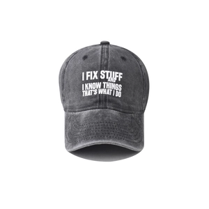 Washed dark grey baseball cap with white slogan I FIX STUFF AND I KNOW THINGS