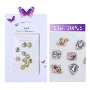 Detail of 01# gold alloy nail art charms with iridescent rhinestones and pearls