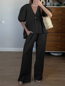 Women's summer two-piece set featuring black V-neck puff sleeve top and wide-leg linen pants