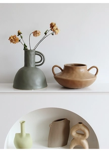Morandi ceramic vases set with matte finish displayed on minimalist arched shelf