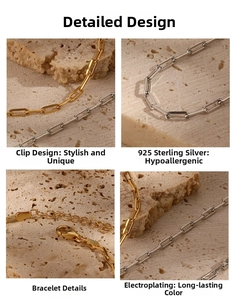 Detailed macro view of 925 sterling silver paperclip chain bracelet with lobster clasp