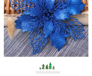 Close-up of blue glitter artificial flower with hollowed mesh petals for Christmas tree